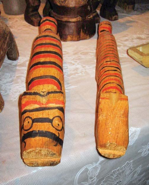 Полосатая кошка, пятнистая кошка Полосатая кошка, пятнистая кошка
